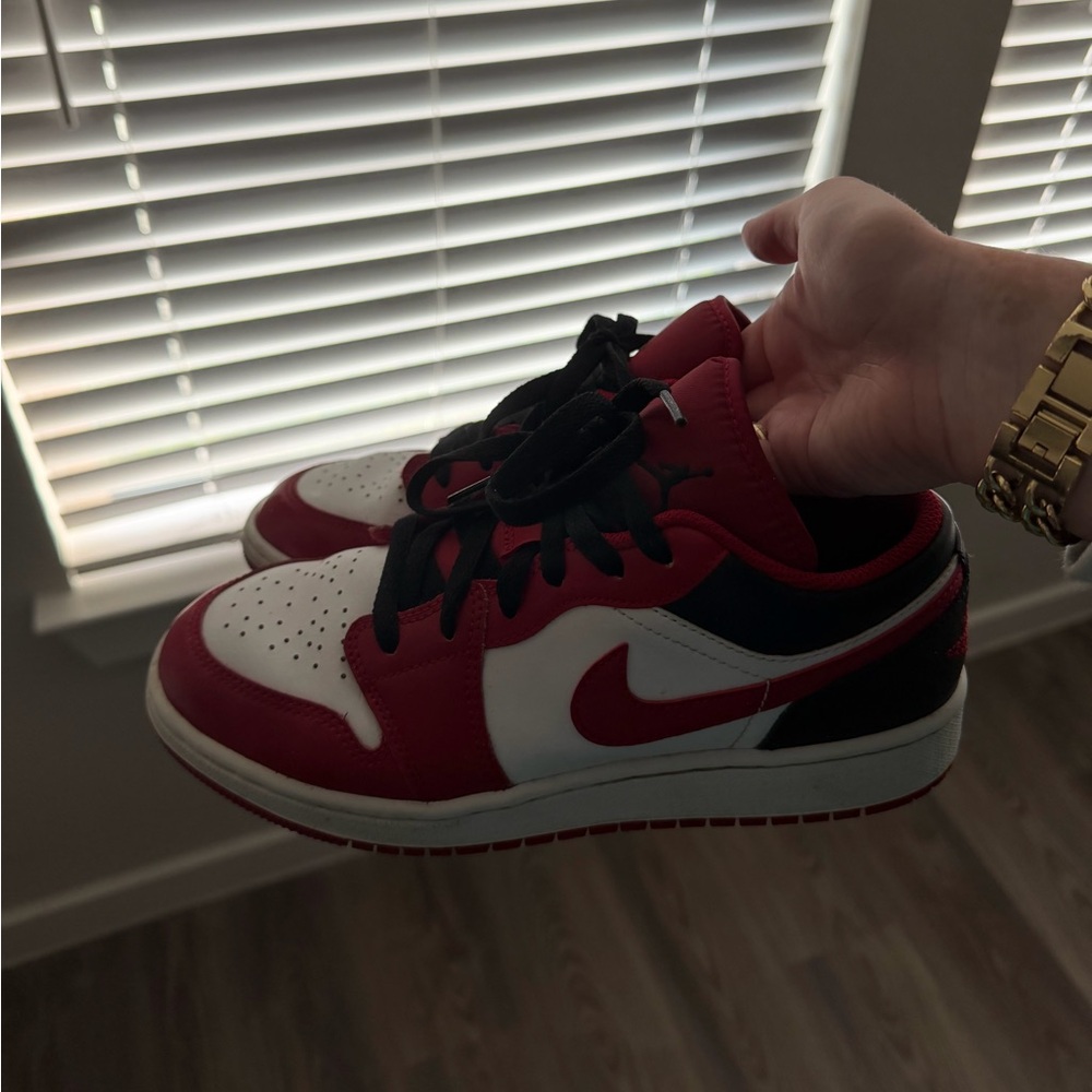 Nike Air Jordan’s Red, White, and Black Sneakers